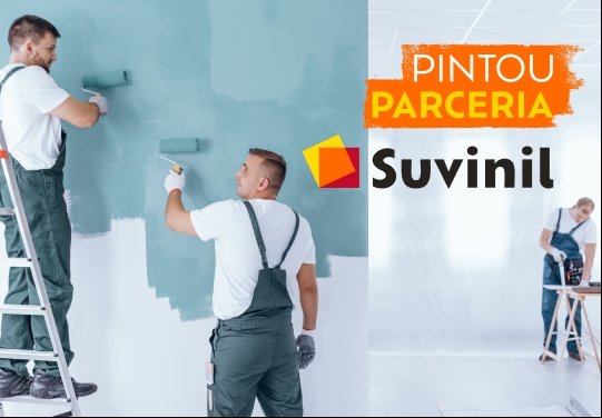duas pessoas pintando parede Dois homens pintando uma parede